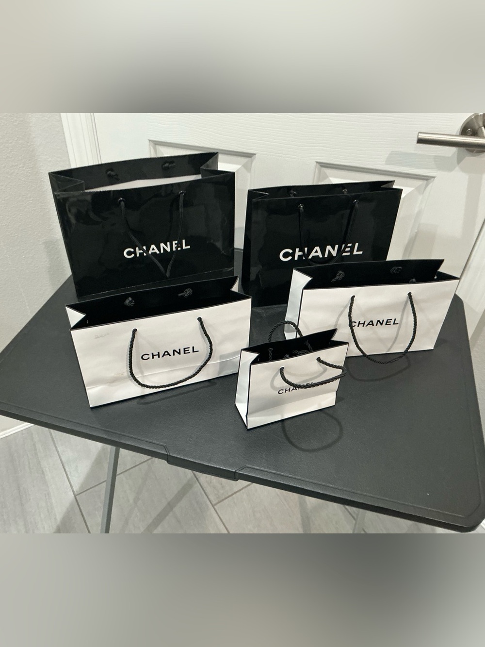 CHANEL paper shopping bags, a lot of five black and white mixed sizes